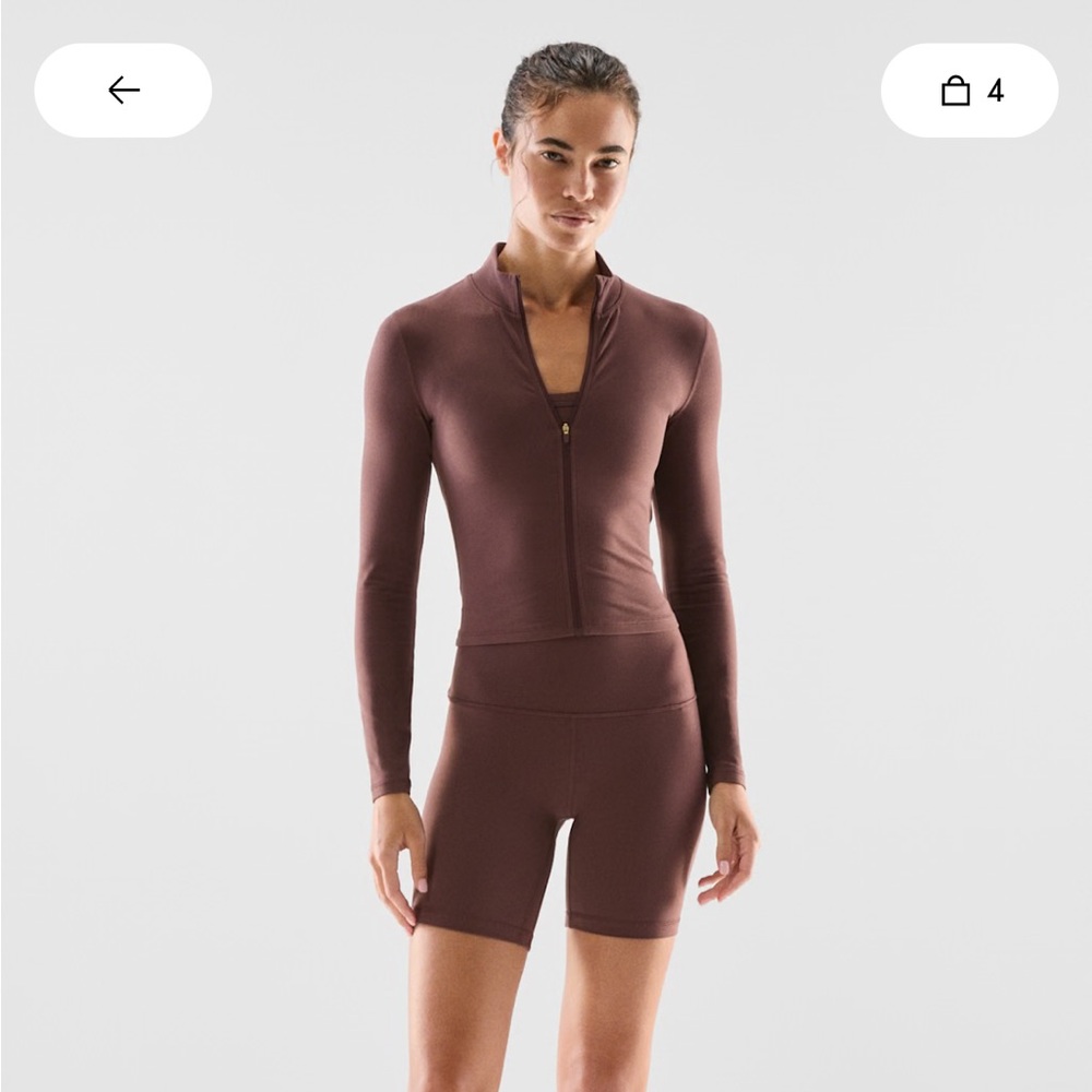 Aritzia Brown athletic jacket or workout Top